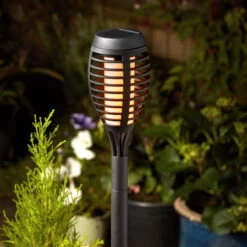 Smart Solar LED Party Flaming Torch Stake Light 5-Pack Warm White Black -Home Lighting Store 6828 1012000 1012003 Party Flaming Torch Black Night insitu 48617.1653987445