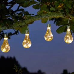 Smart Solar LED Firefly Effect EUREKA! Light Bulbs 6-Pack Warm White Clear 14 Smart Solar LED Firefly Effect EUREKA! Light Bulbs 6-Pack Warm White Clear -Home Lighting Store 6833 1080920RD The Original Eureka Lightbulb 6 pk Night Insitu 23637.1653987281