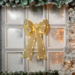 Festive Gold Battery Operated Christmas Door Bow With 84 Warm White LEDs -Home Lighting Store P036710 38518.1669731204
