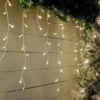 Festive 11.8m Indoor & Outdoor Snowing Effect Icicle Christmas Lights 480 Warm White LEDs