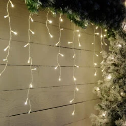 Festive 11.8m Indoor & Outdoor Snowing Effect Icicle Christmas Lights 480 Warm White LEDs